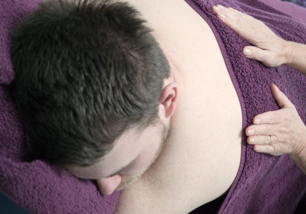Picture of man having relaxing Back Massage